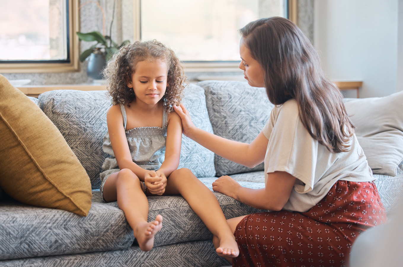 Mom talking to daughter
