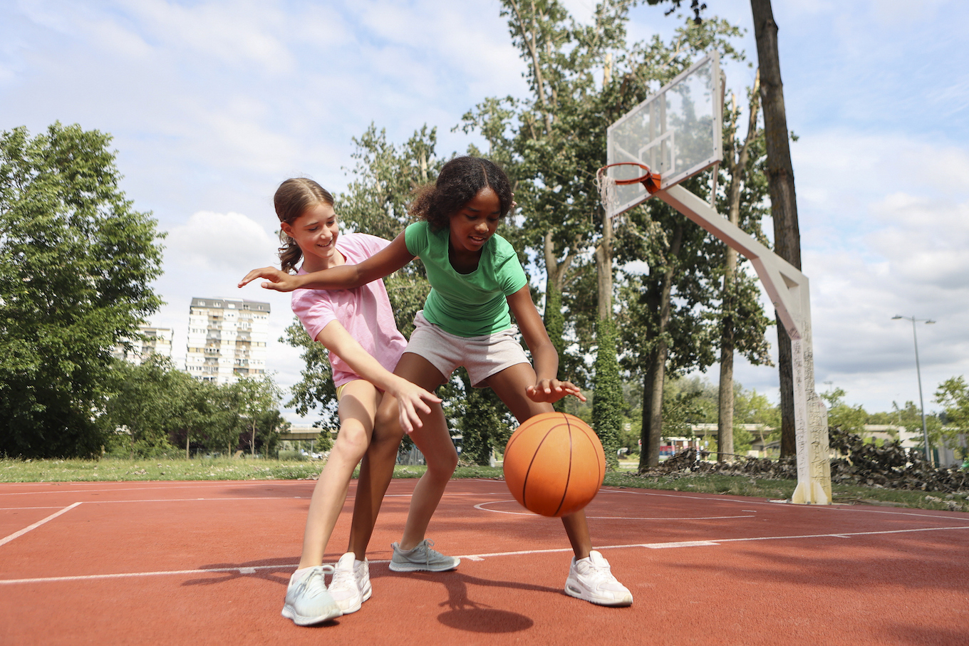 Girls playing basketball