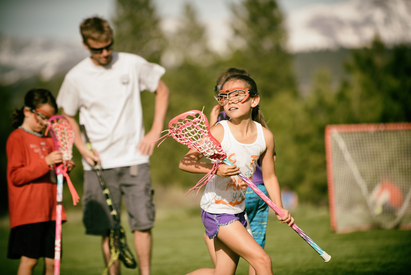 Girl playing lacrosse