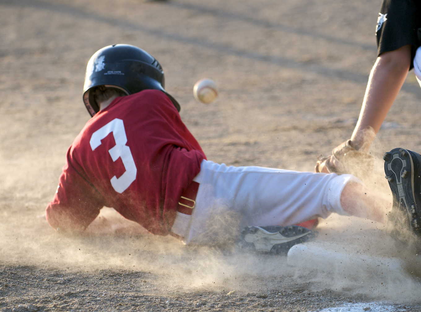 Boy playing baseball
