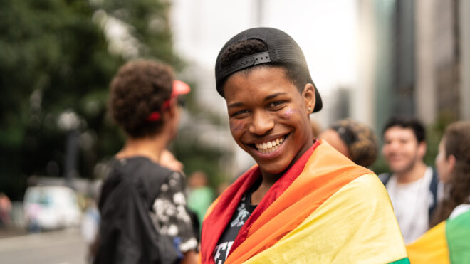 Person wearing a pride flag