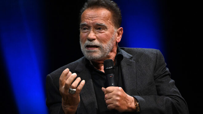 Arnold Schwarzenegger speaks onstage at an Evening with Arnold Schwarzenegger presented by Fane at London Palladium on Oct. 24, 2023, in London, England. Los Angeles police officers responded to a spurious bomb threat at Schwarzenegger's Brentwood mansion on Thanksgiving morning before giving the all clear. (Jeff Spicer/Getty Images for Fane/TNS)